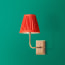 Matchbox cordless wall fixture in antique brass