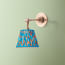 Mumford wall fixture in antiqued brass