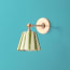 Elbow wall fixture in antiqued brass
