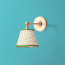 Elbow wall fixture in antiqued brass