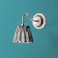 Swan neck wall fixture in antiqued silver