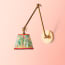 Stork wall fixture in antiqued brass