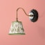 Drake wall fixture in wood and antiqued brass