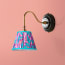 Drake wall fixture in wood and antiqued brass