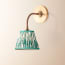 Colombari wall fixture in antiqued brass and cane