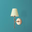 Single Chukka Wall fixture in antiqued brass