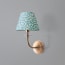 Pringle wall fixture in antiqued brass