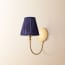 Gramma wall fixture in antiqued brass