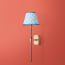 Besidem wall fixture in antiqued brass