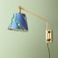 Carter Wall fixture in antiqued Brass