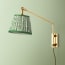 Carter Wall fixture in antiqued Brass