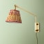 Carter Wall fixture in antiqued Brass