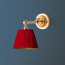 Double jointed wall fixture in antiqued brass