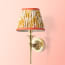 Brighton wall fixture in antiqued brass