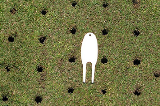 Holes in grass machine top