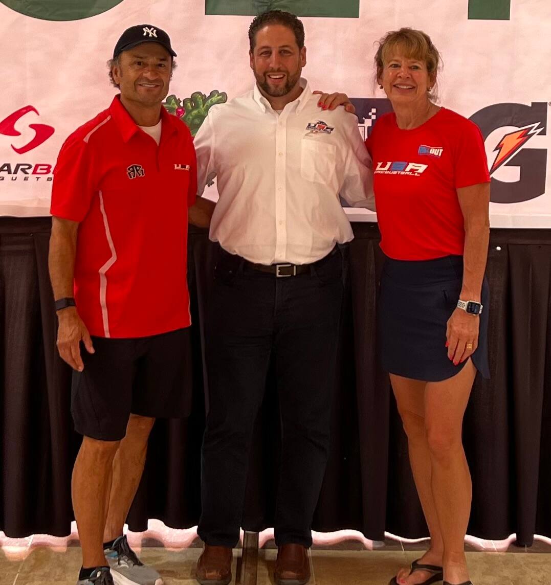 Victor Manilla, USA Racquetball President Stewart Solomon, and Nancy Manilla at the 2022 XXI IRF World Championships