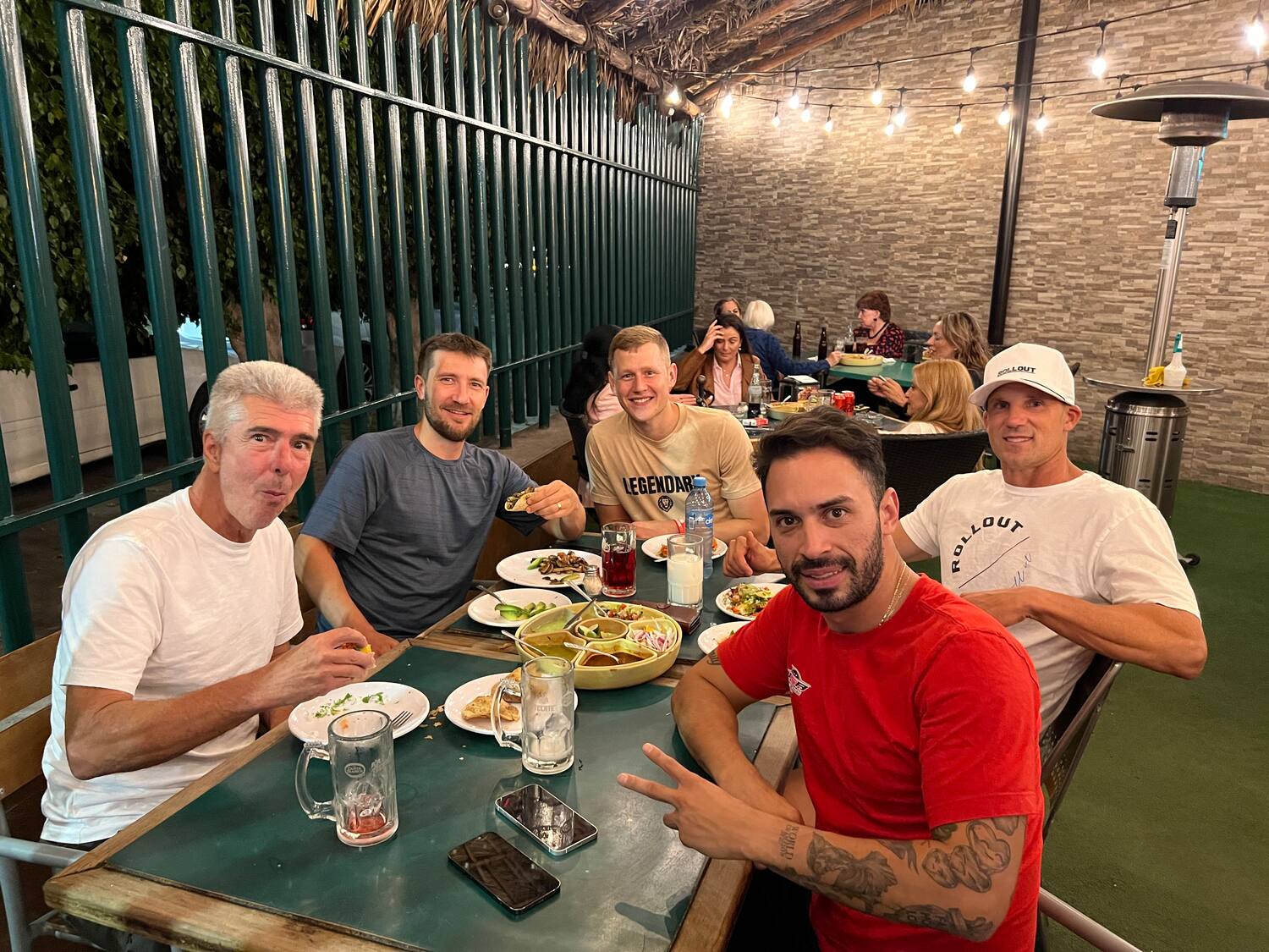 After a day of practice, the Men's Team enjoy an evening of together for dinner.
