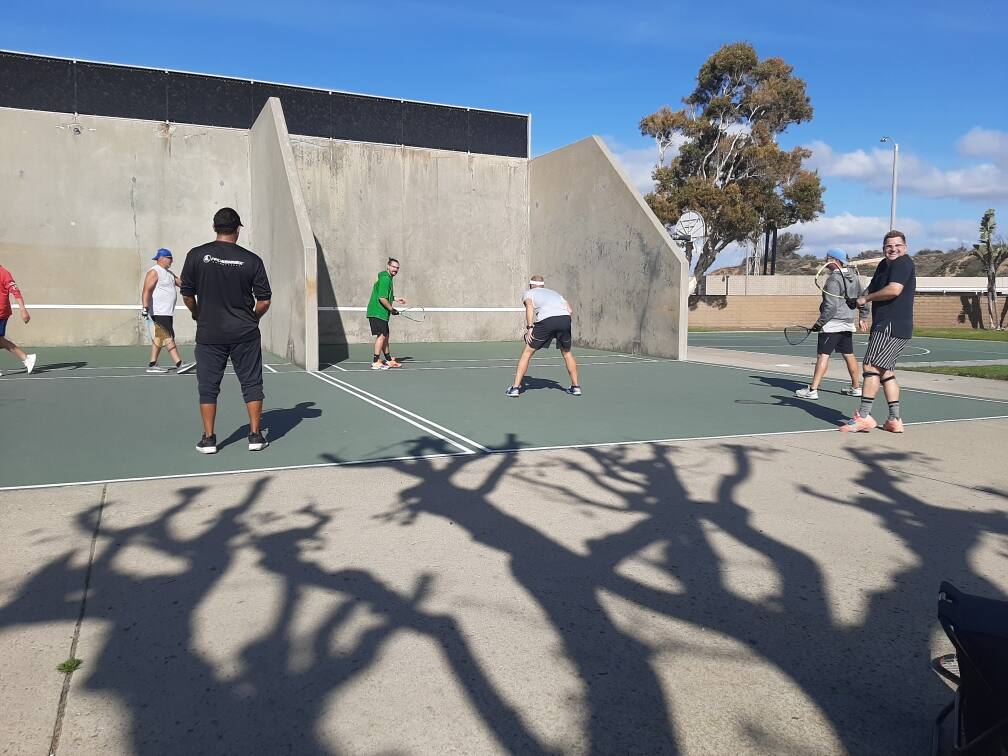 World Outdoor Racquetball Newport Beach January 2022 action shot Rocky Carson, Jesus Ustarroz, Greg Solis, Cesar Chavez, Micah Rich, Jason Geis, and Jeremy McGlothin. Photo courtesy of Mike Coulter