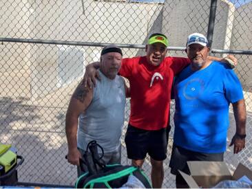 L-R Horacio Honne, Tommy Medina, and Ron Couch celebrate the end of the shootout. Photo courtesy of Honne.