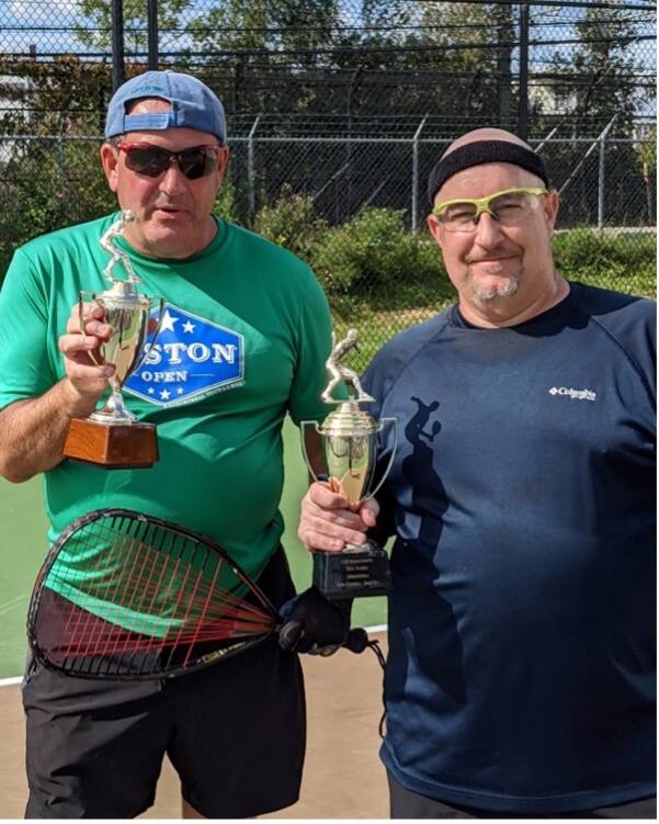 Figure 2: 9/11 Shootout Winners Bill Penny and Ron LaPlante showing off the silverware. Photo courtesy of Jim Bove