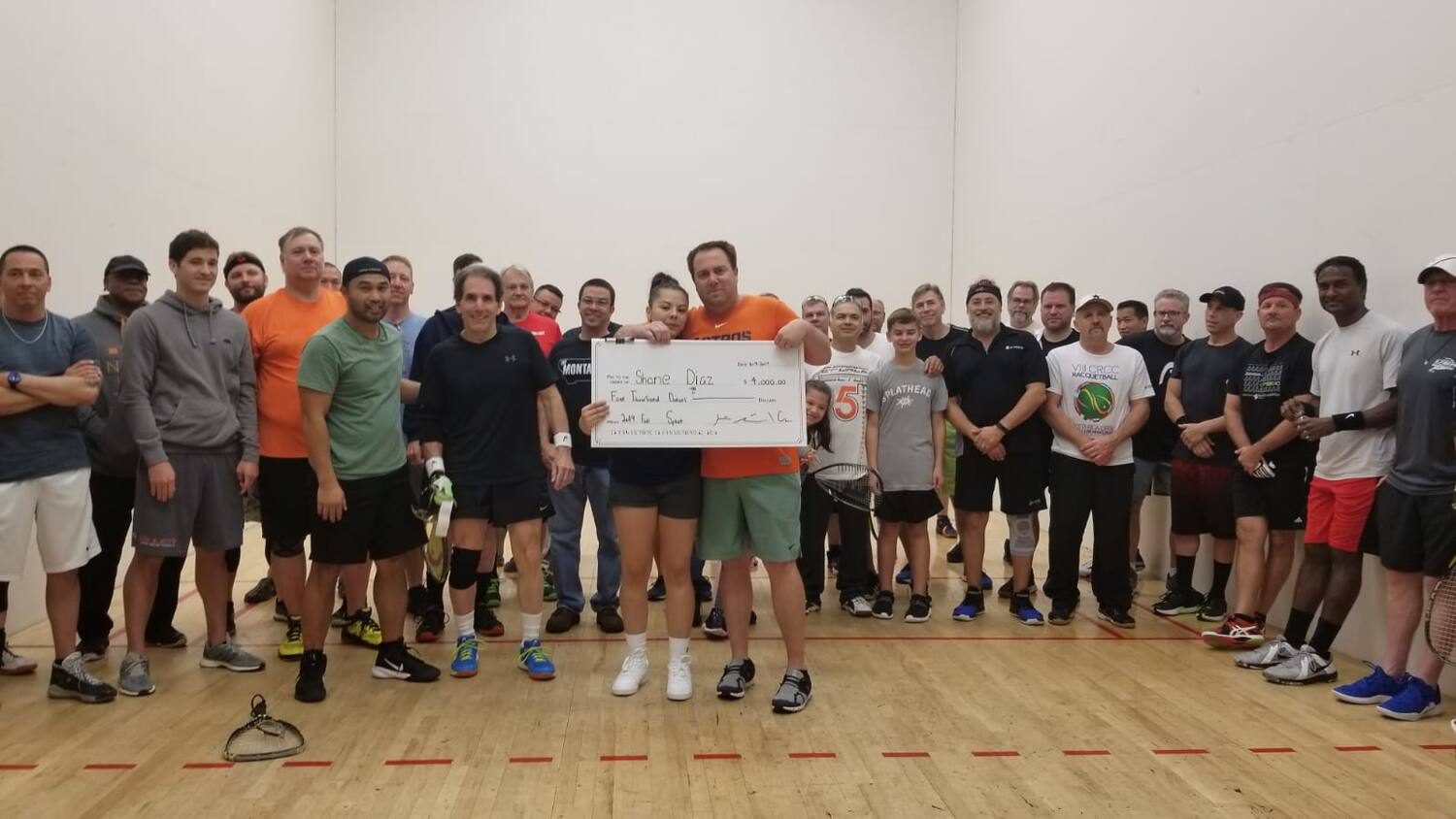 Kevin Sendrey Presents check to Shane Diaz