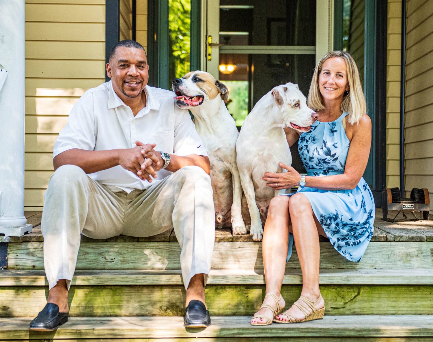 T. J. Baumbaugh with her husband, Ira, and their two dogs
