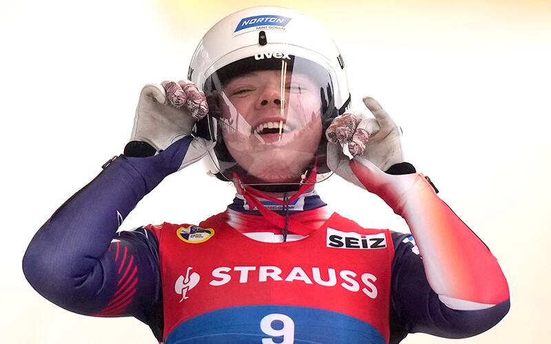 Brittney Arndt of the United States celebrates during the sprint women's race at the Luge World Championships in Oberhof, Germany, Friday, Jan. 27, 2023. (AP Photo/Matthias Schrader)