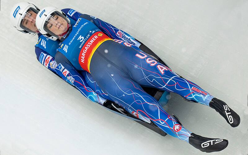 Summer Britcher and Emily Sweeney of the United States during the luge World Cup in Whistler, British Columbia, Saturday, Dec. 10, 2022. (Jonathan Hayward/The Canadian Press via AP)