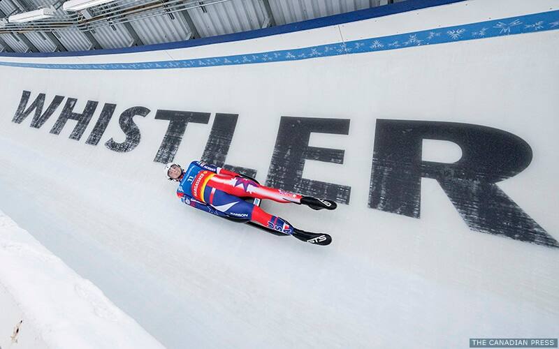 Tucker West, of the United States, competes during the Eberspacher Luge World Cup in Whistler, British Columbia, Friday, Dec. 9, 2022. (Jonathan Hayward/The Canadian Press via AP)