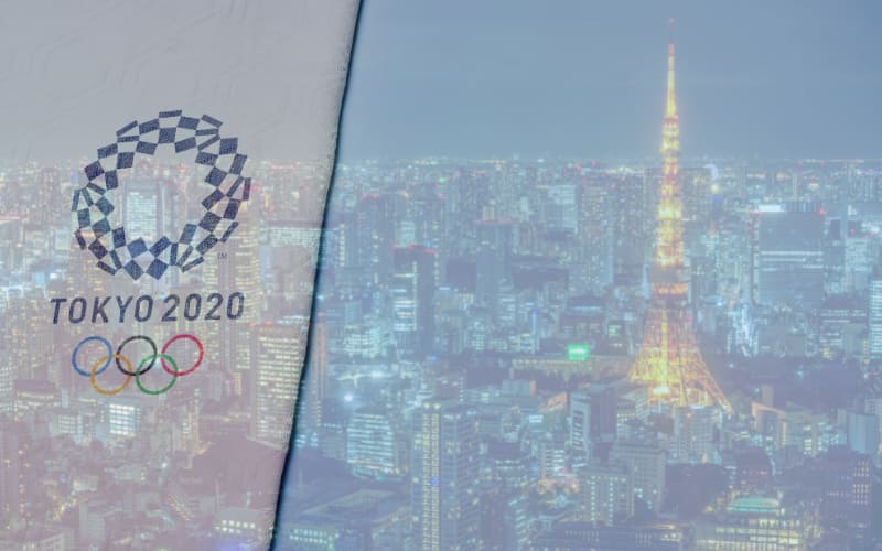 Tokyo Olympics logo over Tokyo background