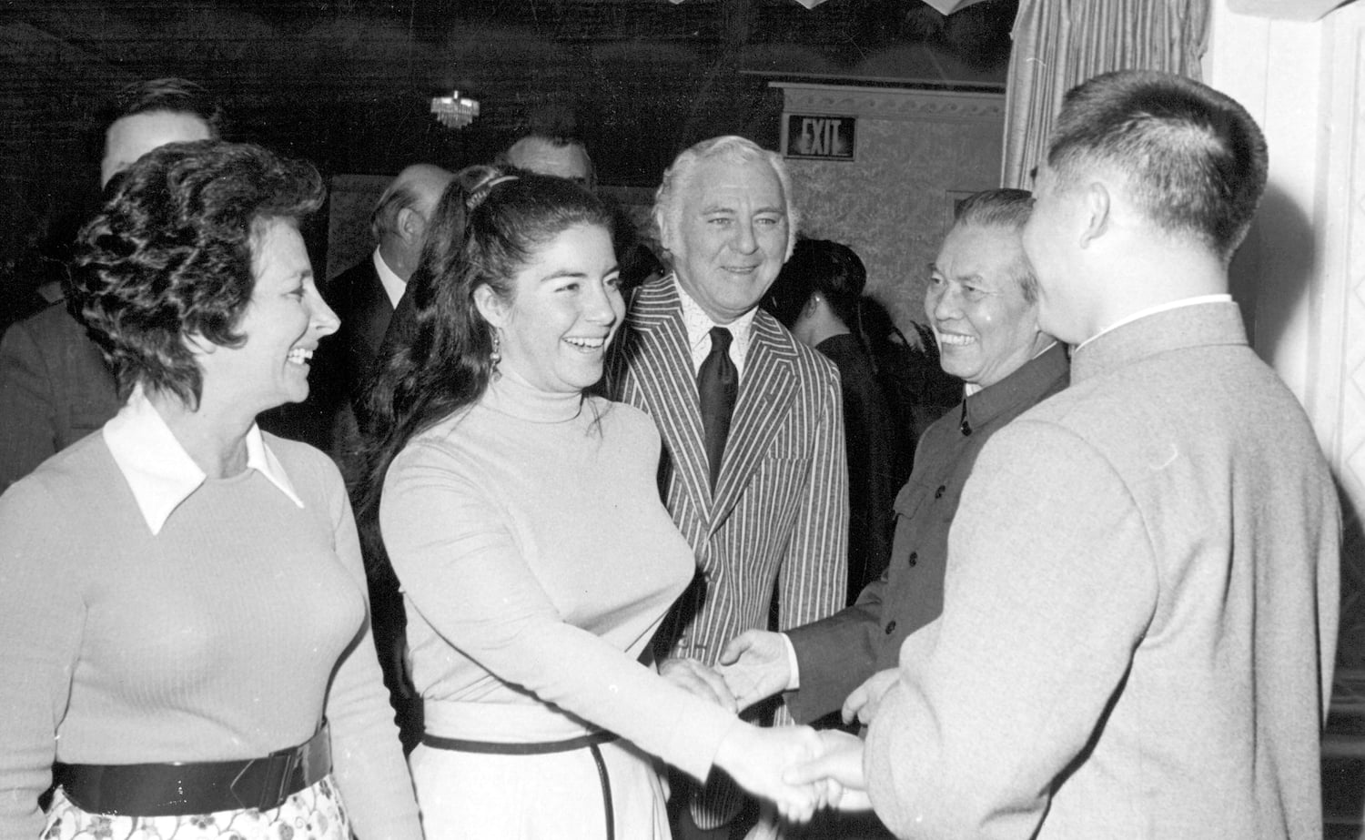 During a reception hosted by PRC Ambassador to the UN Huang Hua (second right) honoring the Chinese Table Tennis Team’s visit to New York, Jan Berris (second left) and her parents meeting table tennis team captain Zhuang Zedong.