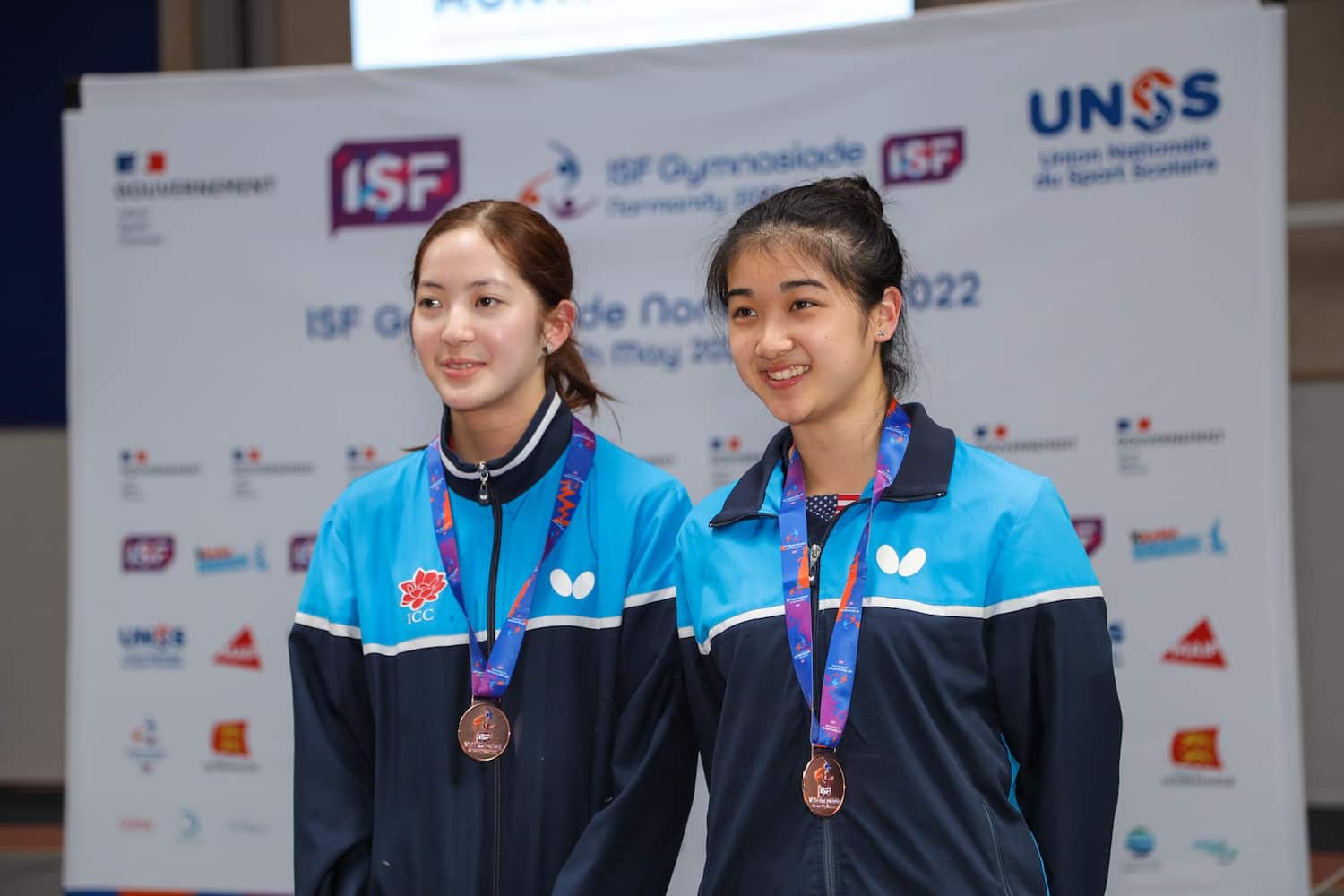 Rachel Sung and Angie Tan earn bronze medals at the ISF Gymnasiade Normandy 2022 in France.