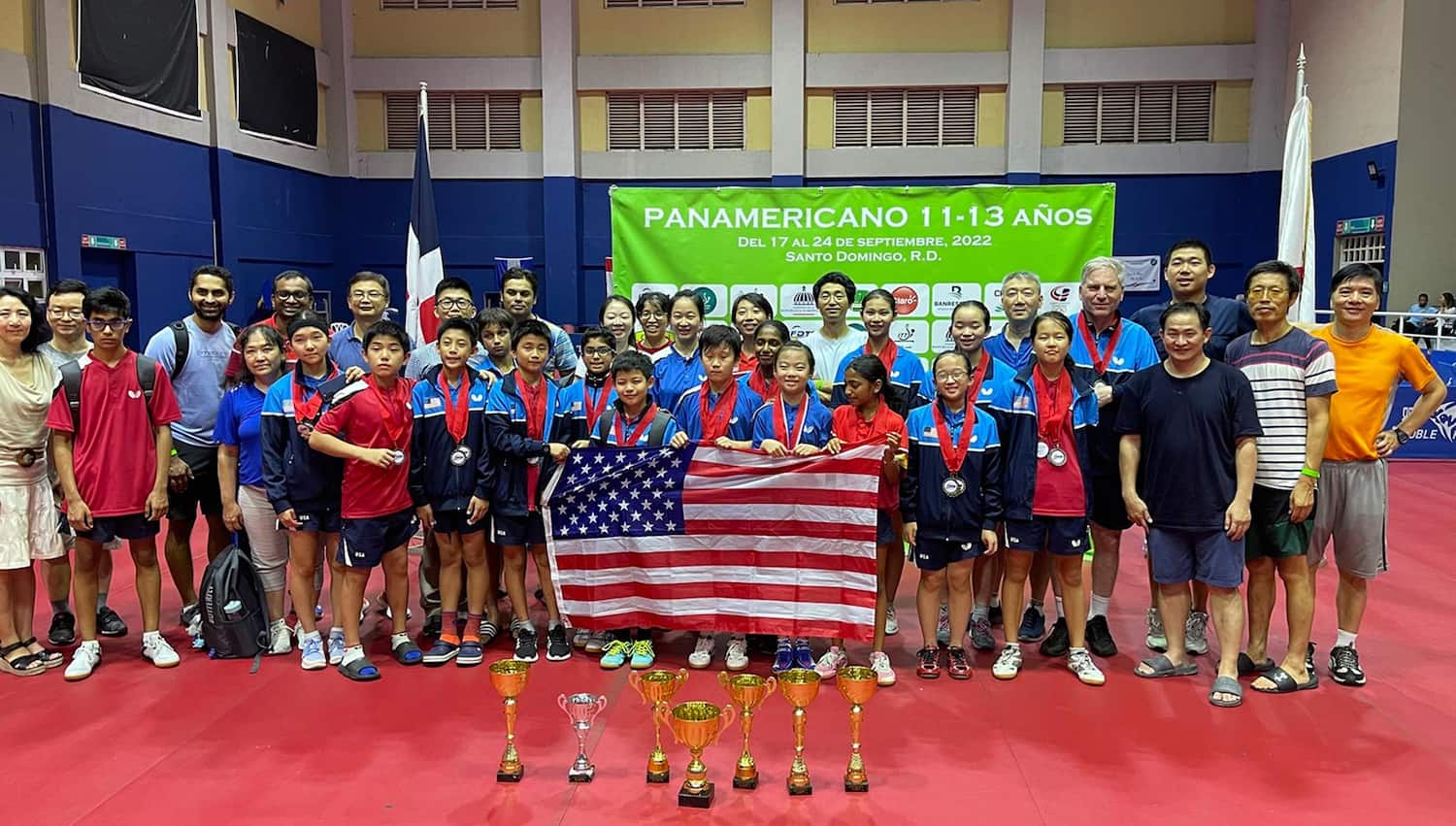 U11 and U13 team photo with coaches and parents at Pan Am Youth Championships in Santo Domingo, DR.