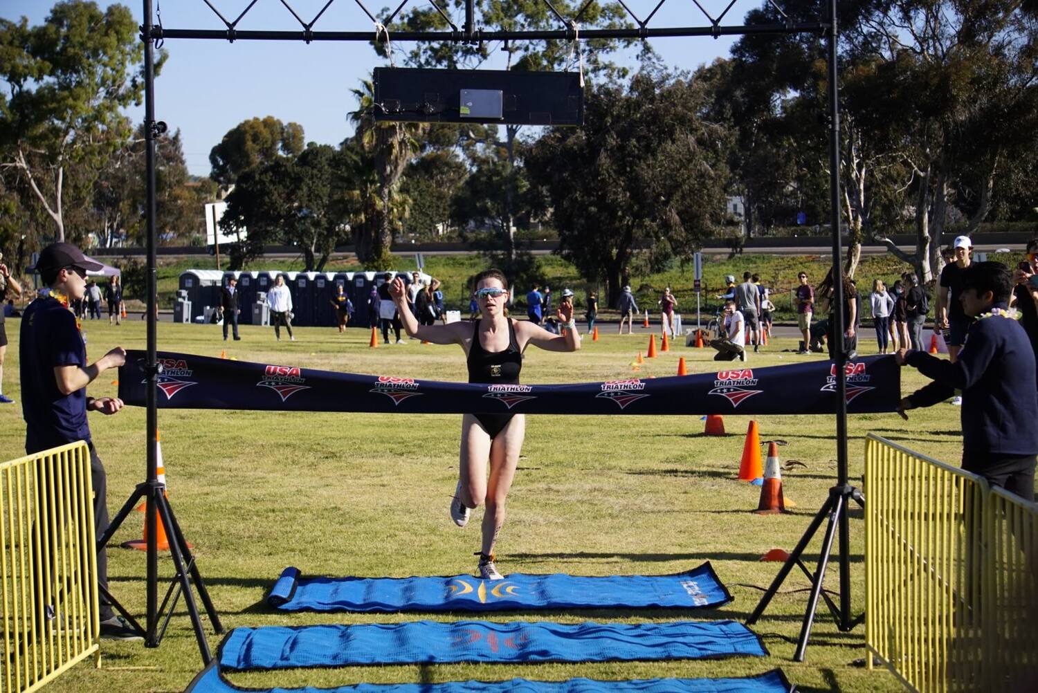 woman finisher at the tritonman triathlon