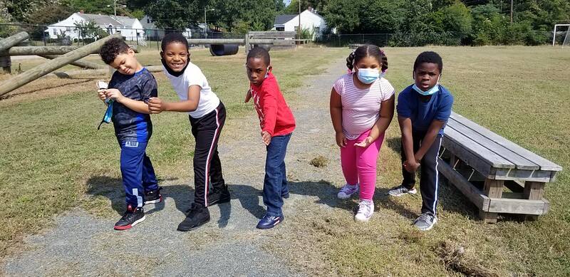 Kids about to take off running at a live red foundation event