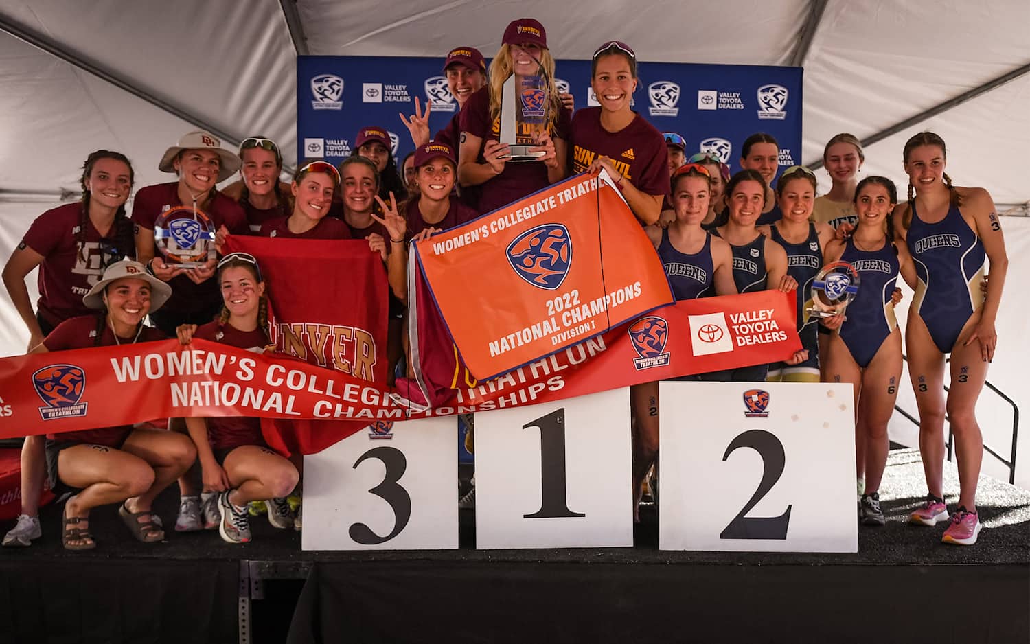 Teams from Division I stand on the awards podium from the NCAA collegiate nationals in Tempe, Arizona