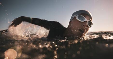 Athlete swimming in open water