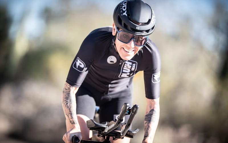 Athlete riding bike