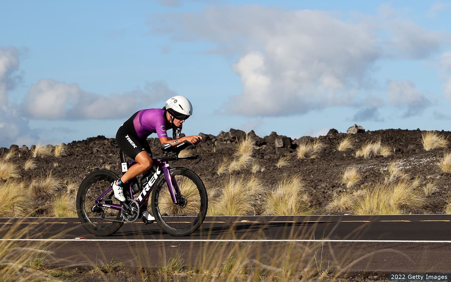 An athlete competes during the bike portion of the 2022 IRONMAN World Championships in Kona, Hawaii.