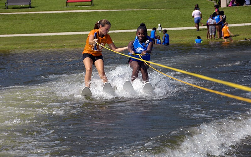 Girl learning to water ski