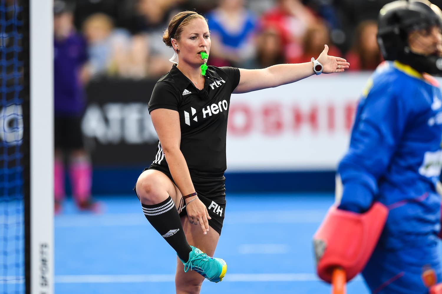 USA Umpire Maggie Giddens officiates the game between Spain and Belgium during the 2018 Vitality Hockey Women's World Cup in London, England