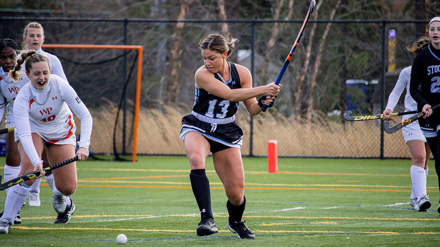 A Stockton student-athlete tees up for a backhand shot