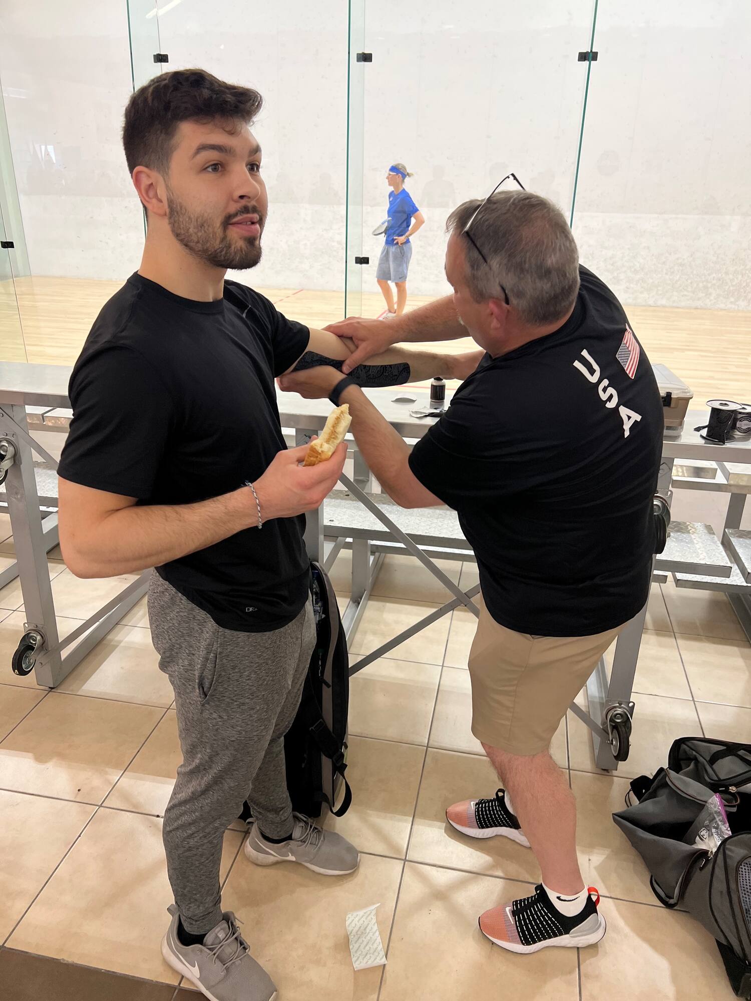 Thomas Carter getting a liitle work down by Trainer Rodger Fleming at the 2023 XXXIV Pan American Racquetball Championships (PARC)