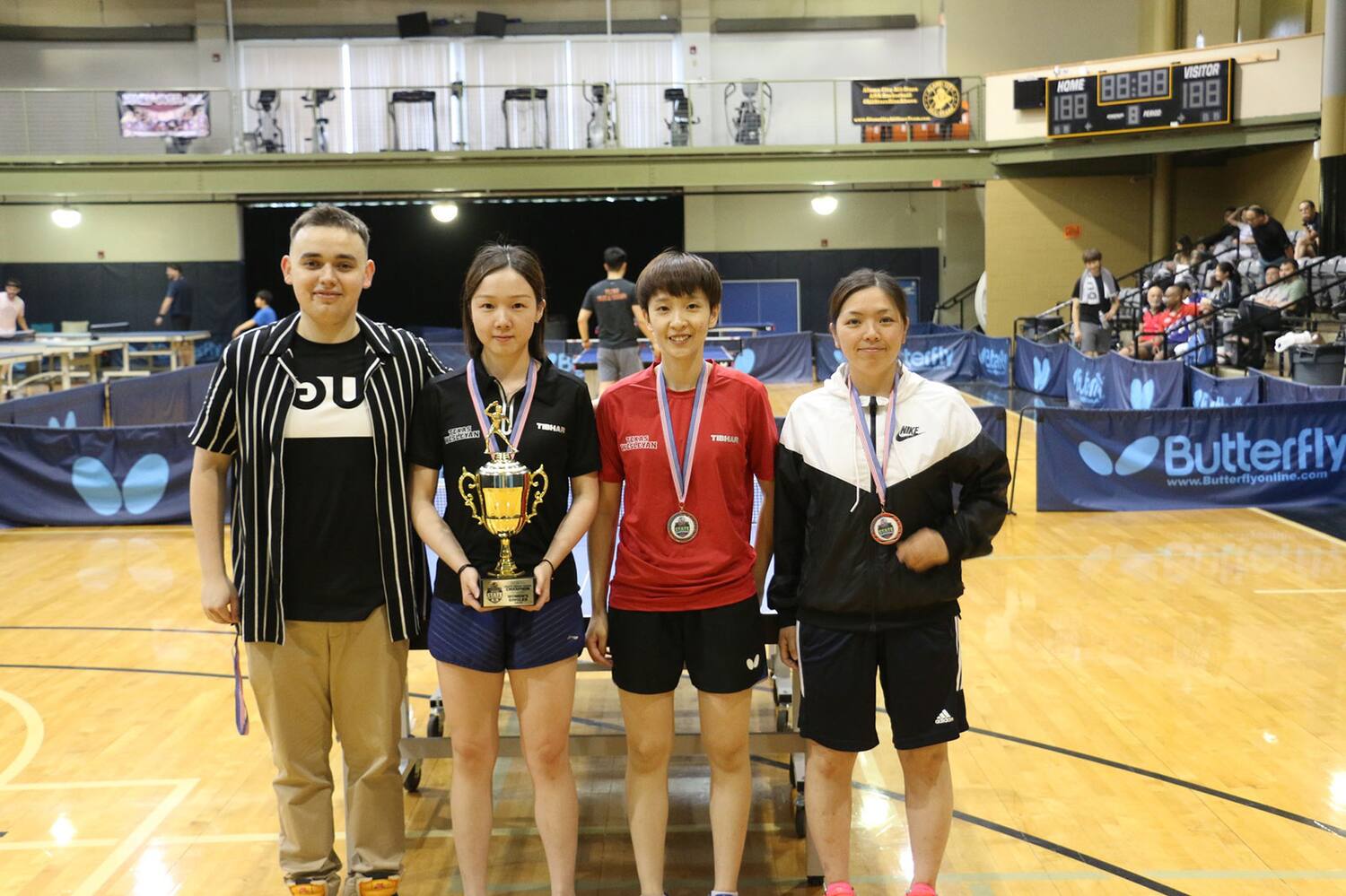 2023 USATT TEXAS STATE CHAMPIONS - WOMEN'S SINGLES . (L-R) Vlad Farcas, Deng Zhen, Jiaqi Lin, and Shoko Kusuhara.