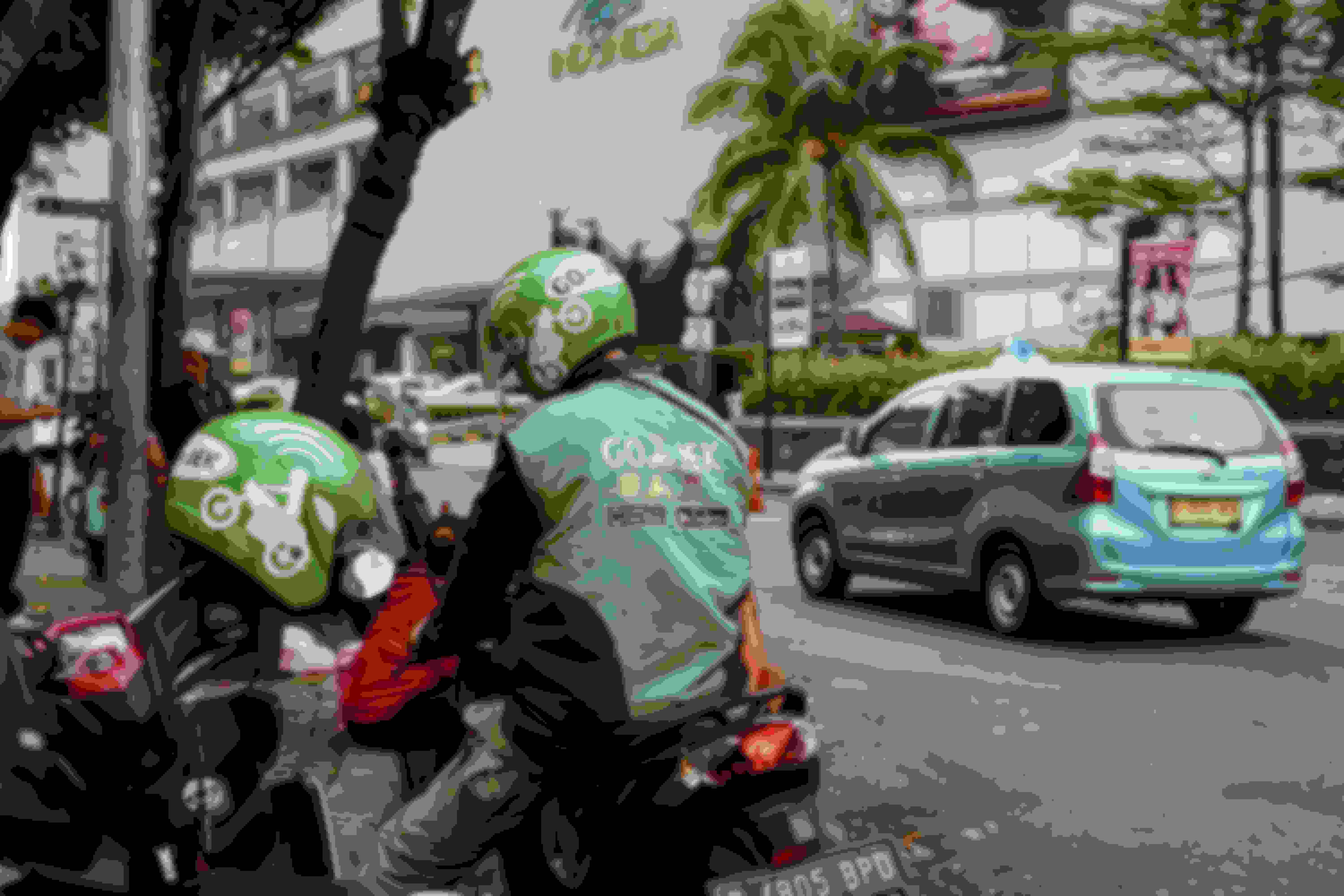 gojek driver on motorbike