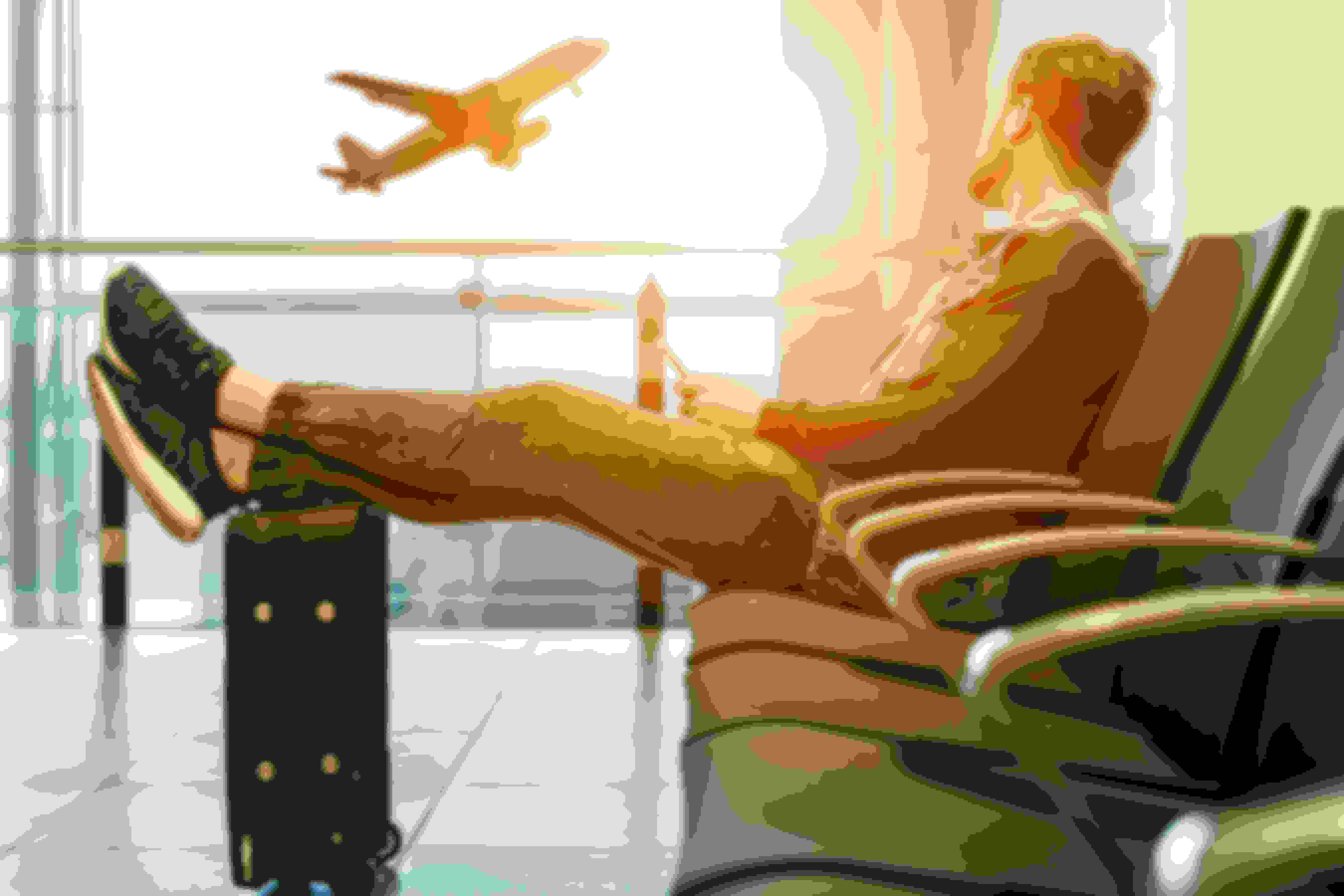 man waiting to fly at airport