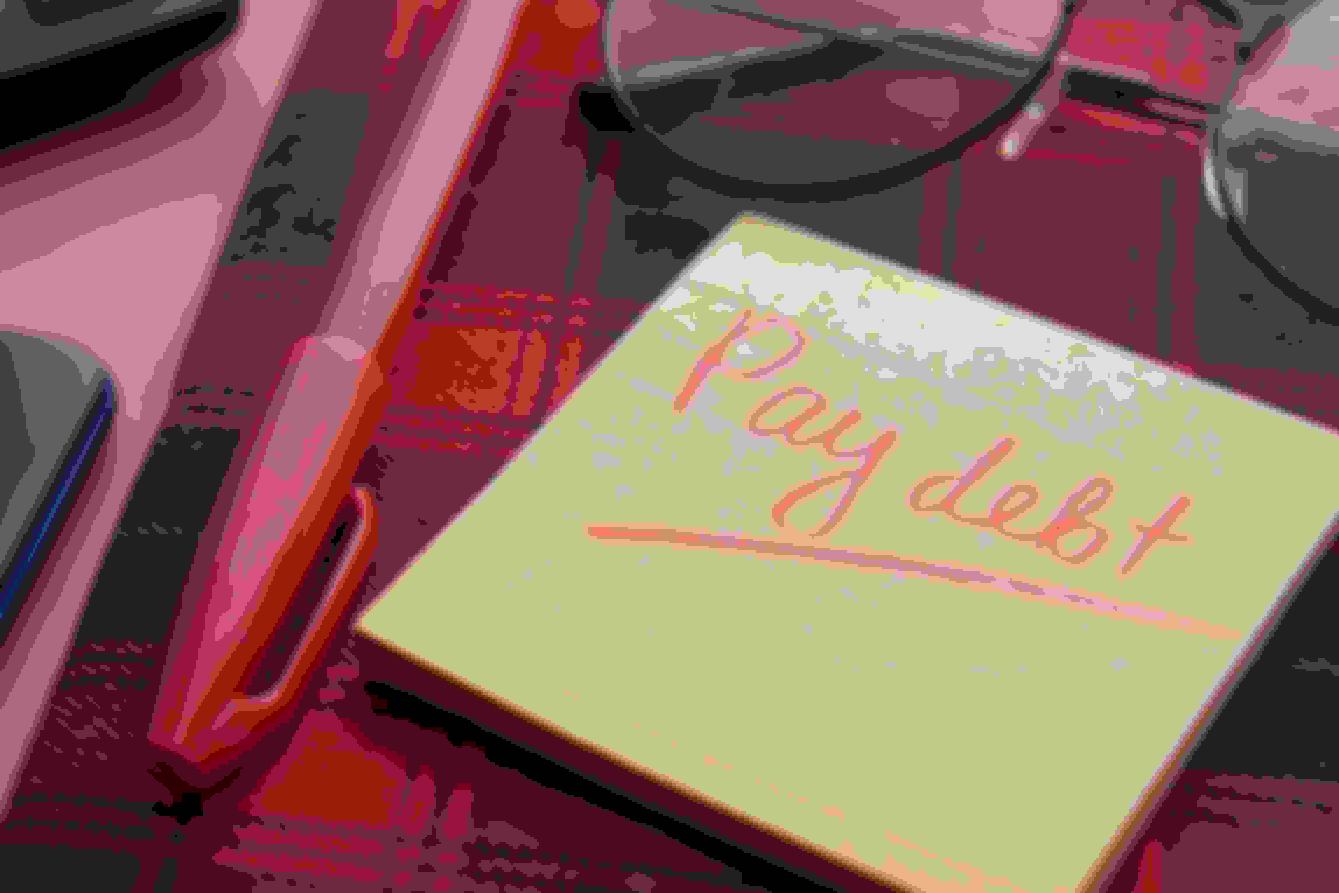 sticky note with words pay debt