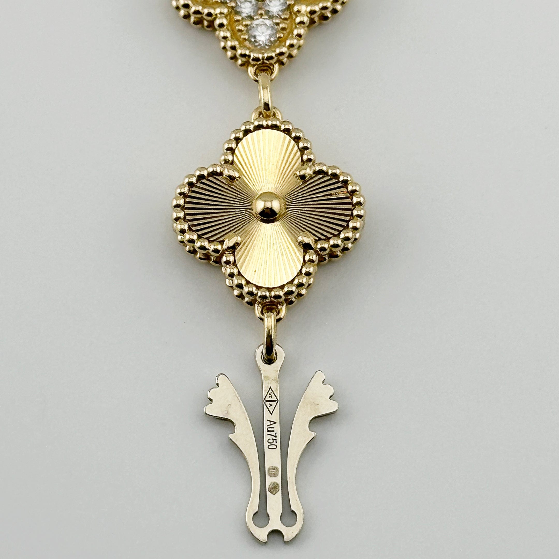 Alhambra Yellow Gold Champagne Dial 23mm Product Image 2