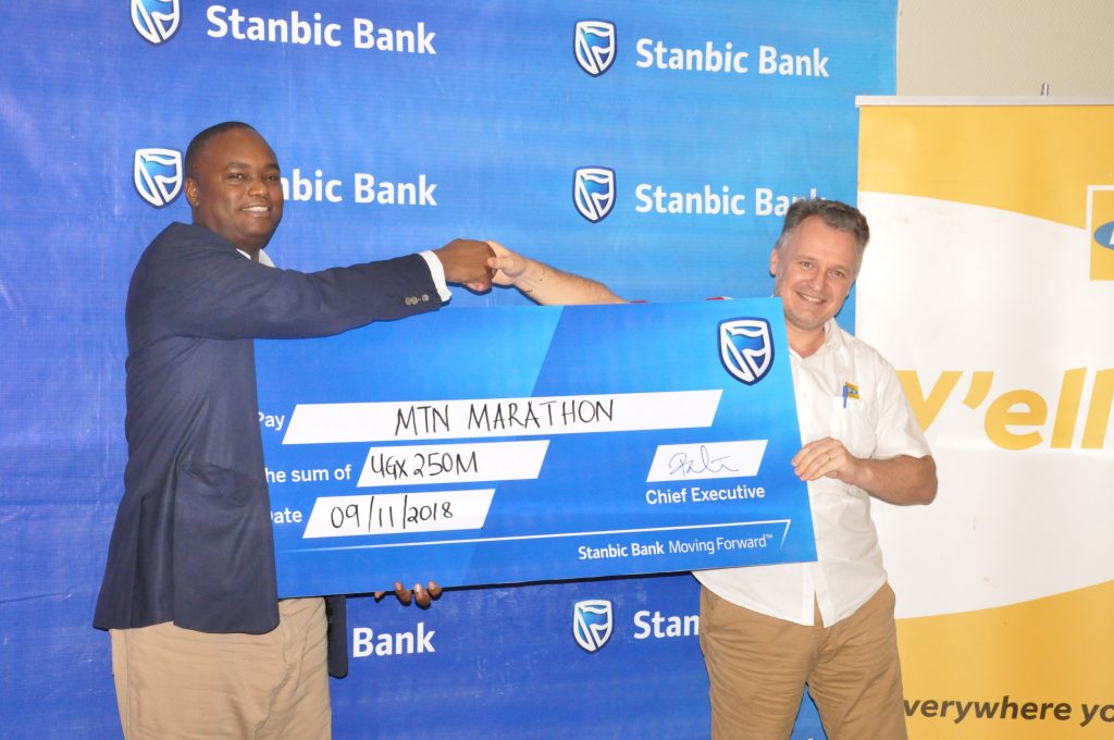 Stanbic hands over MTN Kampala Marathon cheque, increases contribution by 25 million.