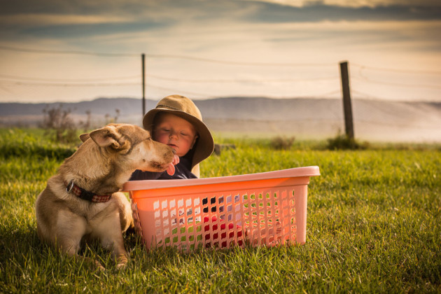 A boy a big hat and his faithful companion © Kelly Ryan